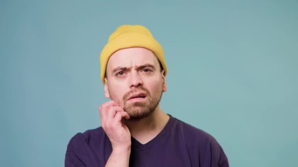 Portrait Pensive Male Skeptical Expression Gazes Plenty Copy Space Text — Stockvideo
