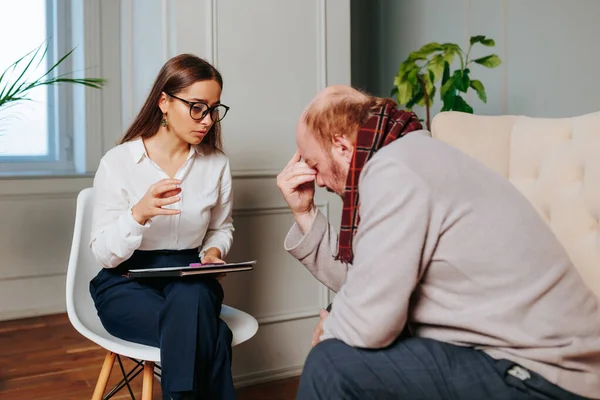Caregiver psychologist console american senior people for mental health, geriatric psychology, Depressed senior man talking with female psychologist, desperate people, emotions sad, elderly worry,