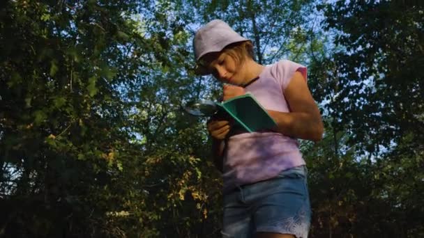 Handsome Curious Kid Naturalist Scientist Explores Plant Life Insect Life — Stok video