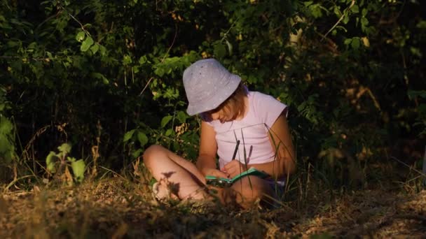Cute Little Girl Kid Naturalist Seated Explores Life Plants Insects — Stockvideo