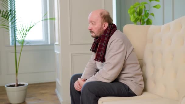 Anxious Worried Elderly Man Sits Alone Worn Beaten Couch Living — Vídeos de Stock