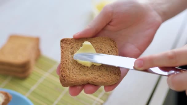 Process Preparing Healthy Breakfast Captured Close Shot Hands Spreading Butter — Wideo stockowe