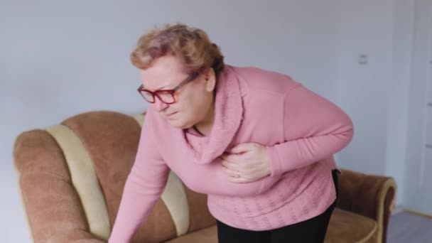 Overweight Overwhelmed Upset Woman Suffers Heart Attack Sofa Older Woman — Stock Video