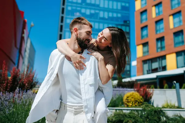 stock image A man and woman, deeply in love, captured in a joyful outdoor portrait. Happiness in the Outdoors Portrait of a Loving Couple