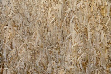 Kontrplak desenli soyut doğal arka plan. Yönlendirilmiş Strand Tahtasının Dokusu (OSB)