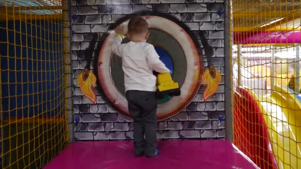 Small Smart Boy Yellow Bulldozer Goes Tunnel Playroom Close Video — Stock Video