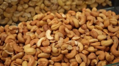 Chia seeds close-up in a black open container on a store counter. Dry healthy ingredient. The concept of proper nutrition. Shot from above.