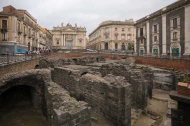 CATANIA, SICILY  - APRIL 22, 2019: Ruins of the Anfiteatro Romano di Catania in Sicily
