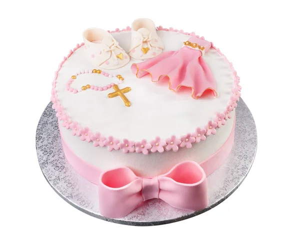 Christening cake for a newborn girl. Decorated with sugar paste. In pink and gold colors. On a white background. High quality photo