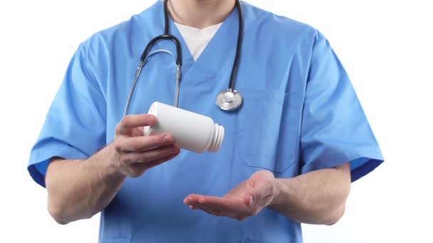 Doctor Uniform Stethoscope Pours Out Pills Jar Concept Limiting Spreading — Video Stock
