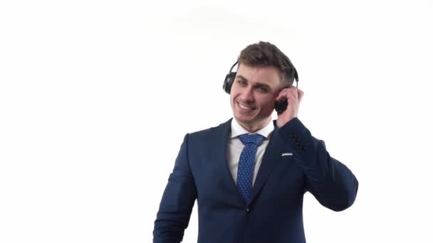Male Businessman Suit Tie Headphones His Head Dances Listens Music — Video