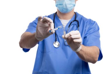 A young medic doctor chemist with a stethoscope pours out the contents of a test tube with a vaccine for a sample. The concept of the study of microbiology. High quality FullHD footage