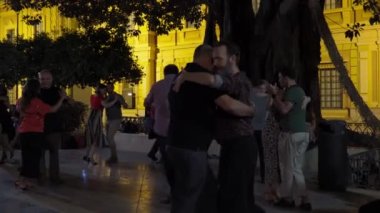 On the streets of Seville in Spain, tango dance lessons are held in the park for all tourists and residents of Spain. Valencia Spain 16 September 2022. High quality 4k footage