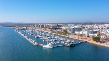 Aerial view of the Portuguese fishing tourist town of Olhao overlooking the Ria Formosa Marine Park. High quality photo