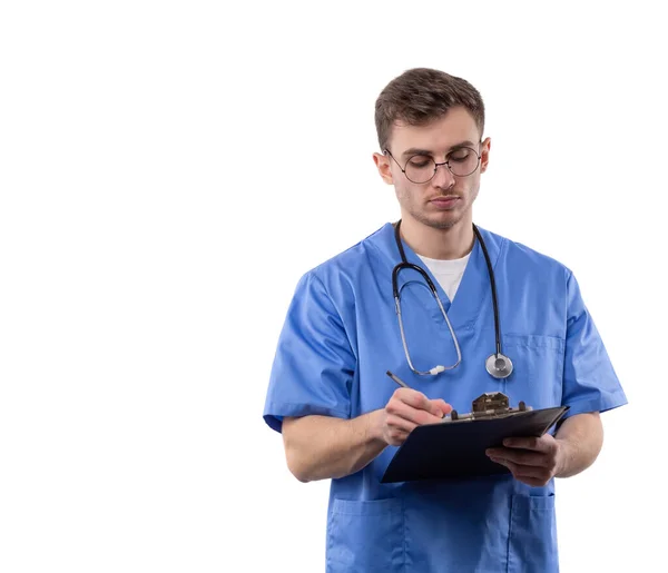 Young Doctor Uniform Stethoscope Writes Annotations Notebook Concept Development Young — Stok fotoğraf