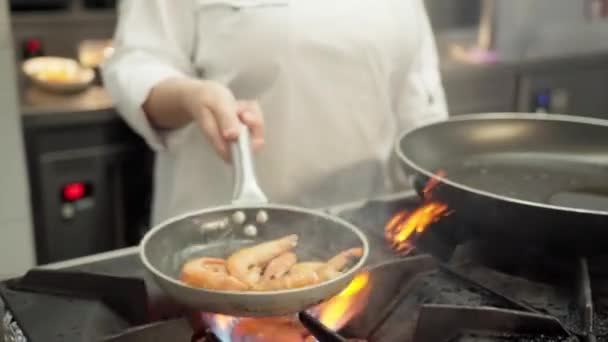 Chef Prepares Delicacy Sea Dish Fried Shrimp Frying Pan High — Stock Video
