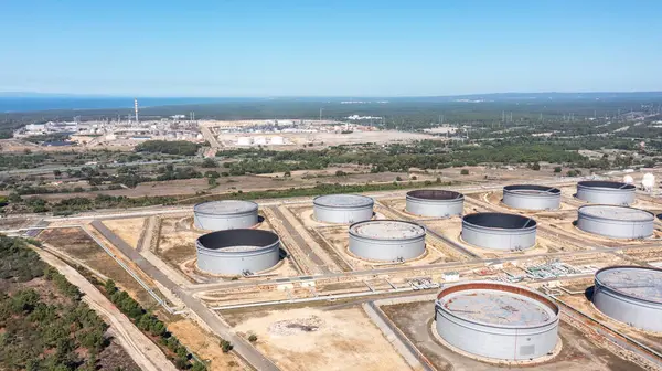 Oil terminal storage tanks, aerial view, oil and gas storage tanks, oil refinery chemical products. High quality 4k footage. Portugal Sines