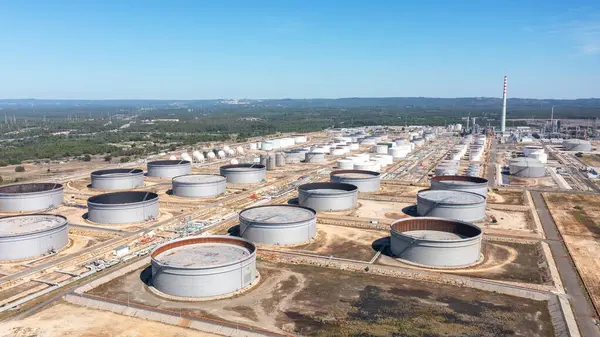 Oil terminal storage tanks, aerial view, oil and gas storage tanks, oil refinery chemical products. panoramic view High quality 4k footage. Portugal Sines