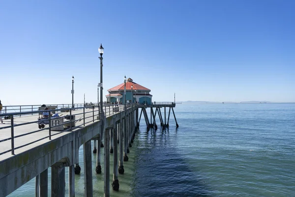 stock image Huntington Beach, California  United States - February 12, 2022: The ocean and a parcial view of Huntington Beach Pier