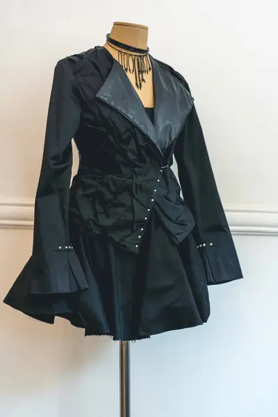 Dressed in black mannequin's torso. Fashion design concept