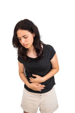 Genç kız karın ağrısından muzdarip. Ergenlikte adet sancısı