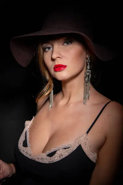 Sexy Fashionable Woman Elegant Hat Black Dress Mysterious Blonde Retro Stock Image