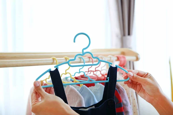 Mother Hands Holding Hanger Clothes Hang Wood Rack House — Stock Photo, Image