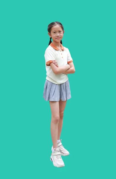 Smart Asian Girl Child Standing Crossing Arms Isolated Green Background — Stock Photo, Image