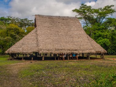 Iquitos, Peru- Mar 28, 2018: House of  Yagua tribe indian clipart
