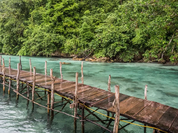 stock image Ora Beach, Indonesia - February 14, 2018: Wooden pond on the water  in Ora Beach Resort, Seram Island, Central Maluku, Indonesia