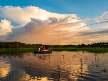 Sunset time over the Ukajali River in Amazon Rainforest,  Amazonia, Pacaya Samiria National Reserve, Peru, South America.