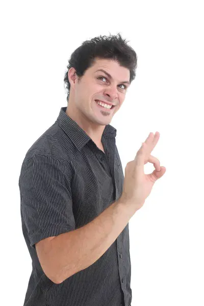 stock image handsome man with evil look showing ok sign