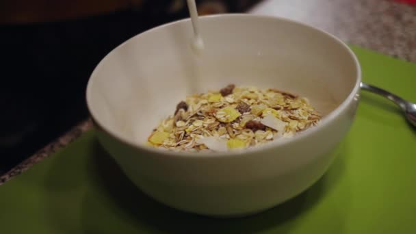 Woman Pouring Milk Bowl Oats Cereal High Quality Fullhd Footage — Stock Video