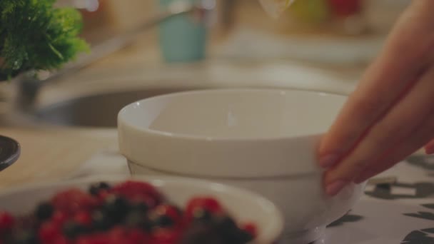 Woman Pouring Oatmeal Bowl High Quality Fullhd Footage — Stock Video