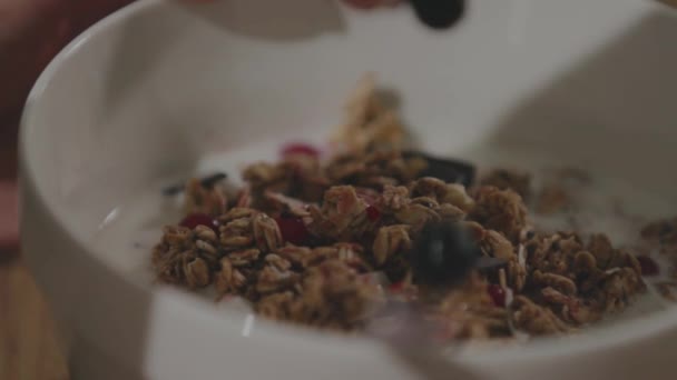 Woman Putting Berries Cereal Oatmeal Breakfast High Quality Footage — Stock Video