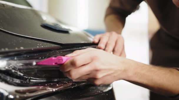 Young Male Female Worker Wraps Wet Paint Protection Film Gravel — Wideo stockowe