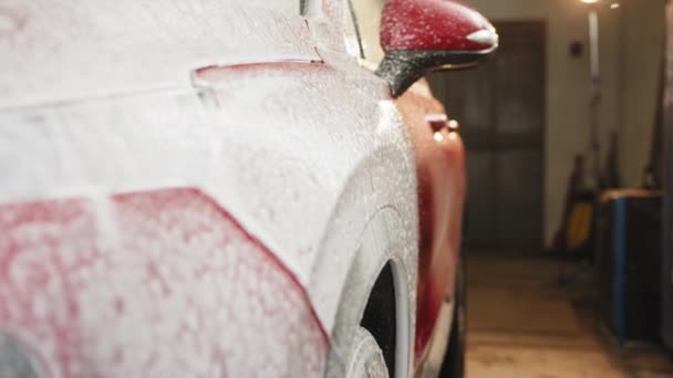 Washing Car Headlight Auto Wash Service Soapy Red Car Washing — Vídeo de Stock