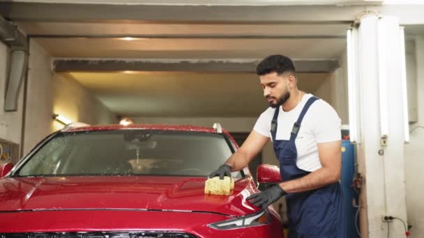 Car Washing Detailing Concept Young Concentrated Bearded Male Worker Holding — Stok video