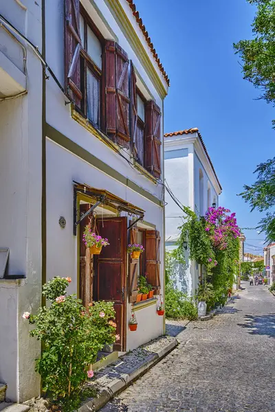 stock image Bozcaada, Turkey, Colorful streets with old beautiful houses and bright flowers,