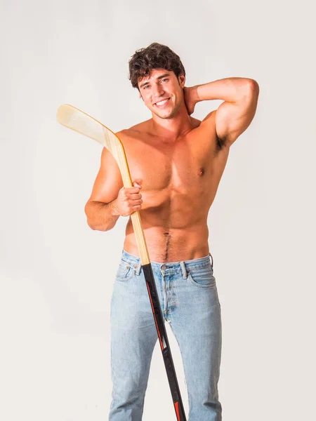 Portrait Handsome Young Man Posing Shirtless Camera Hockey Stick His — Fotografia de Stock