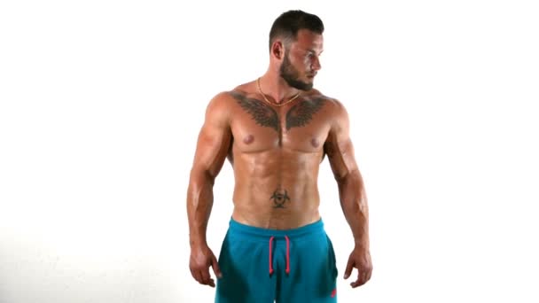 Shirtless Muscular Man Standing Relaxed Pose Looking Camera Bodybuilder White — Video Stock