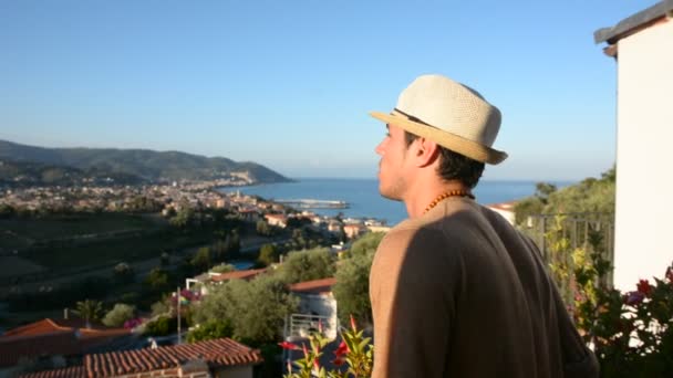 Handsome Dark Haired Young Man Standing Balcony Looking Out Sea — Stock Video