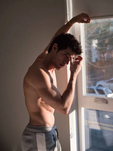 Sexy Handsome Young Man Standing Shirtless His Bedroom Next Window — Fotografia de Stock