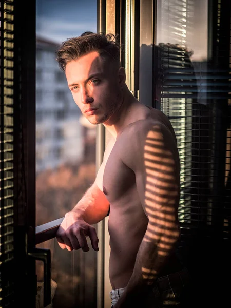 Portrait Sexy Shirtless Man Covered Shadow Stripes Window Looking Camera — Stock Photo, Image
