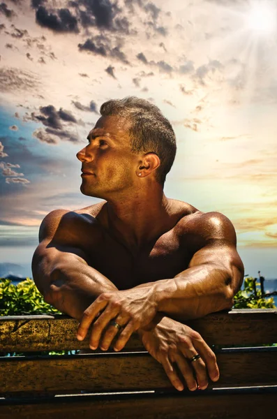 Handsome Muscular Shirtless Hunk Man Outdoor Seaside Looking Side Sitting — Stock Photo, Image
