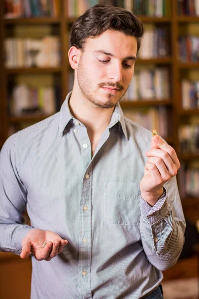 Young Attractive Man Home Taking Medicine Tablet Pill Standing — Stock Photo, Image