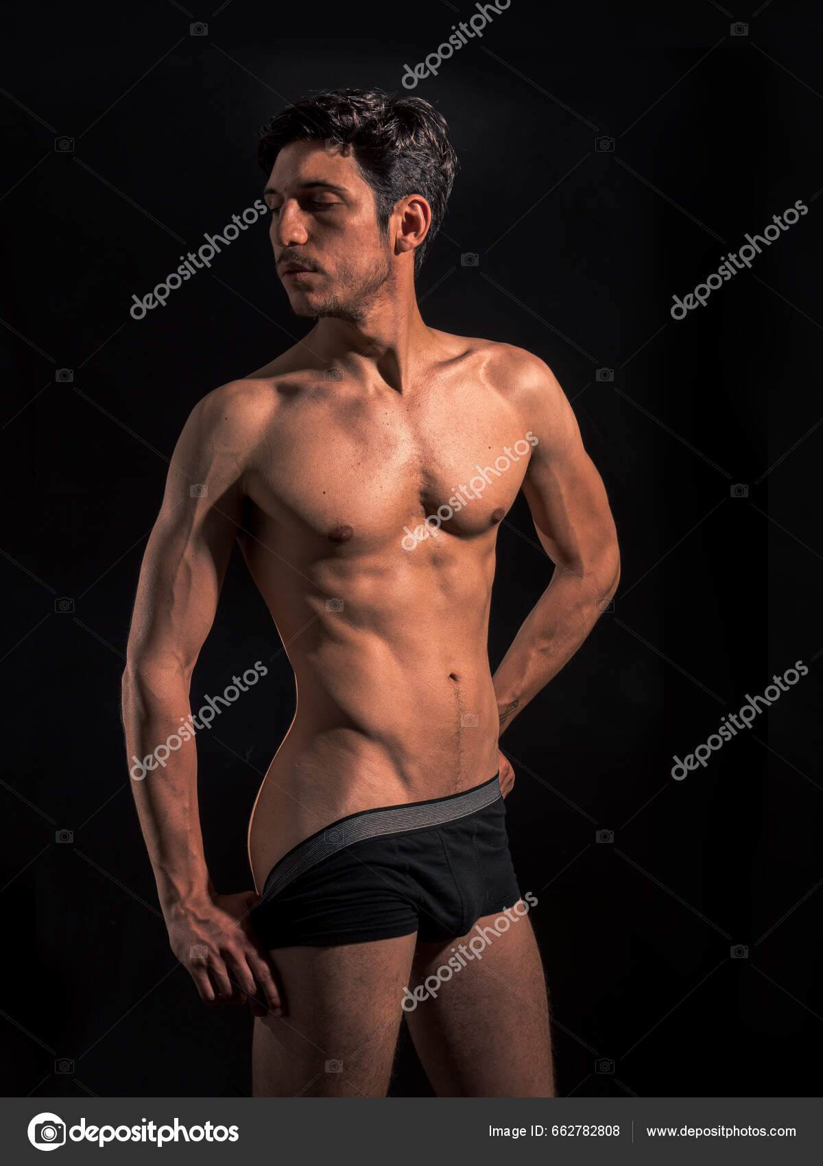 Muscular Man Pulling Underwear Show His Butt Studio Shot fotos