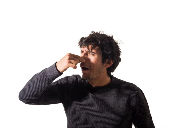 Hombre Haciendo Una Cara Graciosa Con Dedo Cerrando Nariz Por —  Fotos de Stock