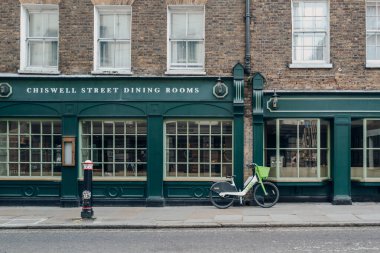 London, UK - February 02, 2023: Lime bike parked on a street in Barbican, London. Lime acquired the Jump e-bike and scooter business from Uber in May 2020.