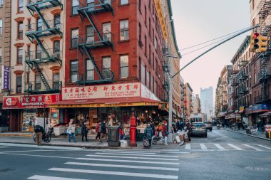 New York, USA - November 21, 2022: Shops on a street in Chinatown, Lower Manhattan. Chinatown is home to the highest concentration of Chinese people in the Western Hemisphere.